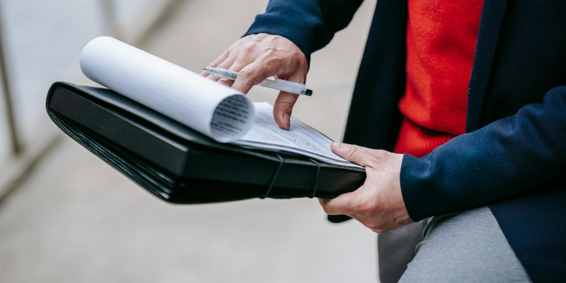 Person filling out EPC paperwork