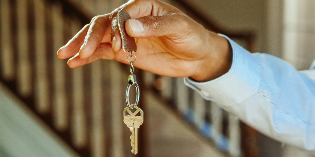 Hand holding keys